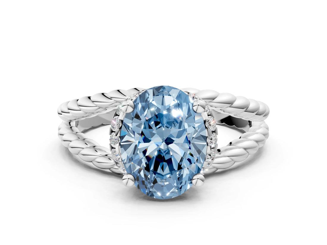 White gold Fancy Blue Oval  Halo Twisted Band Four-Prong Ring_50