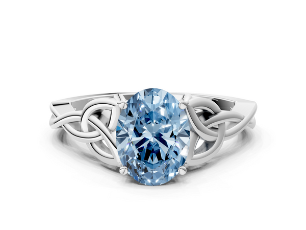 White gold Fancy Blue Oval Cut Diamond Solitaire Engagement Ring with Celtic Knot Band and Four-Prong Setting