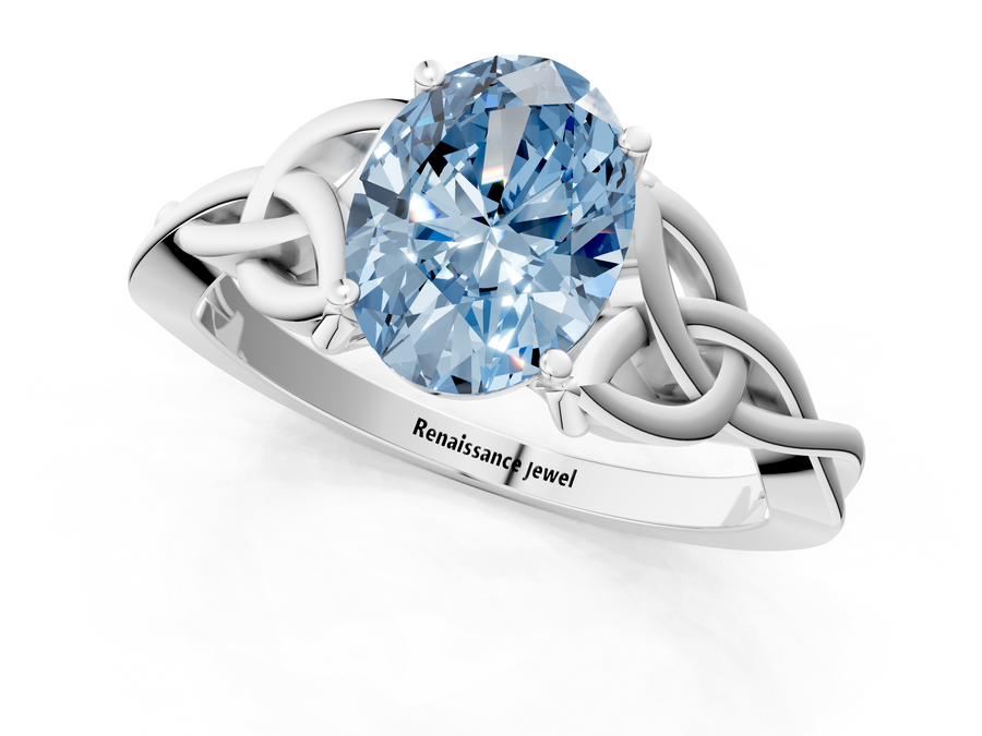 White gold Fancy Blue Oval Cut Diamond Solitaire Engagement Ring with Celtic Knot Band and Four-Prong Setting