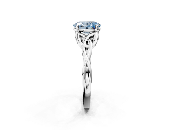 White gold Fancy Blue Oval Cut Diamond Solitaire Engagement Ring with Celtic Knot Band and Four-Prong Setting