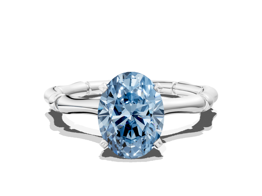 White gold Fancy Blue Oval  Solitaire Diamond Ring with Bamboo Band and Four-Prong Setting_111