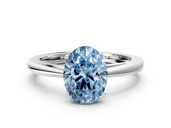 White gold Fancy Blue Oval  Solitaire Diamond Ring with Split Shank and Four-Prong Setting