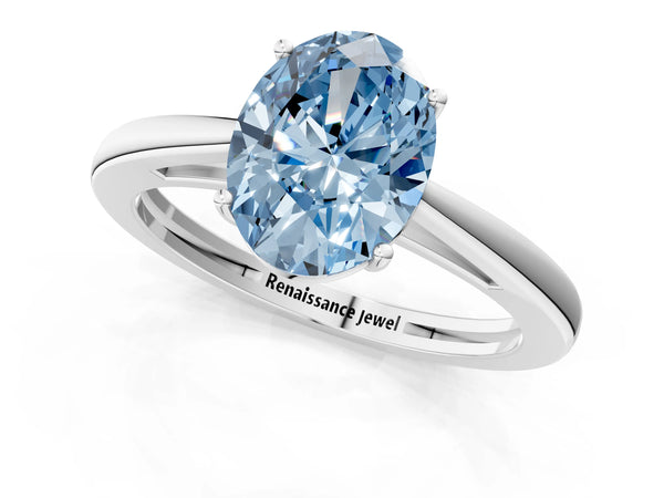 White gold Fancy Blue Oval  Solitaire Diamond Ring with Split Shank and Four-Prong Setting