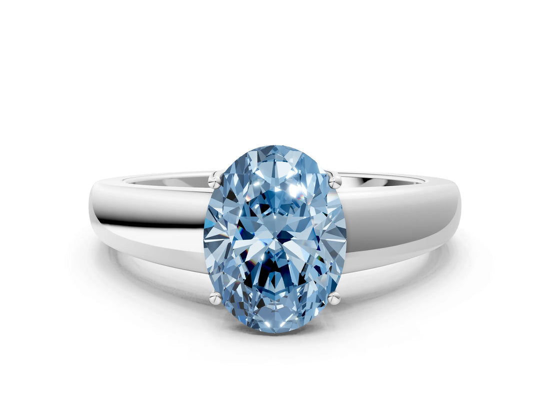 White gold Fancy Blue Oval  Solitaire Diamond Ring with Tapered Band and Four-Prong Setting_49