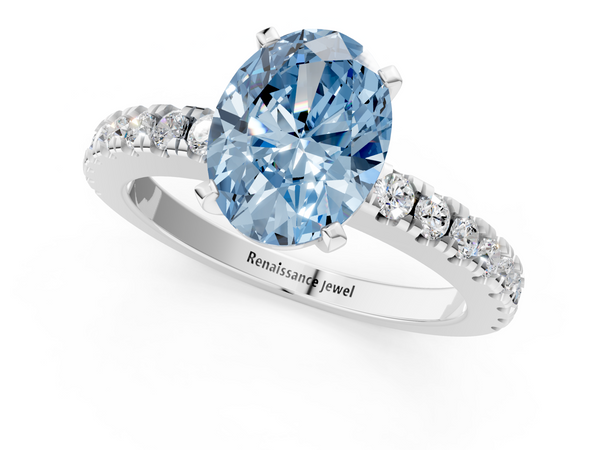 White gold Fancy Blue Oval  Solitaire Diamond with Pavé Band and Four-Prong Setting