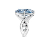 White gold Fancy Blue Oval  Solitaire Twist Band with Leaf Prong Setting