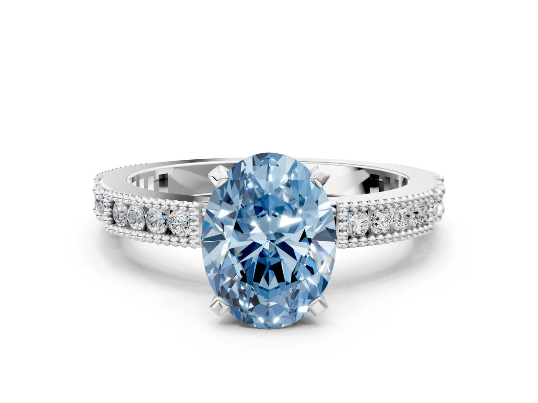 White gold Fancy Blue Oval  Solitaire with Pavé Band and Four-Prong Setting_297