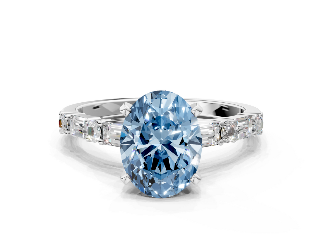 White gold Fancy Blue Oval  Solitaire with Side Baguettes and Channel Set Band_117
