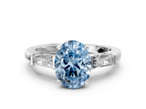 White gold Fancy Blue Oval  Solitaire with Tapered Baguette Side Stones on a Classic Band with Four-Prong Setting_114