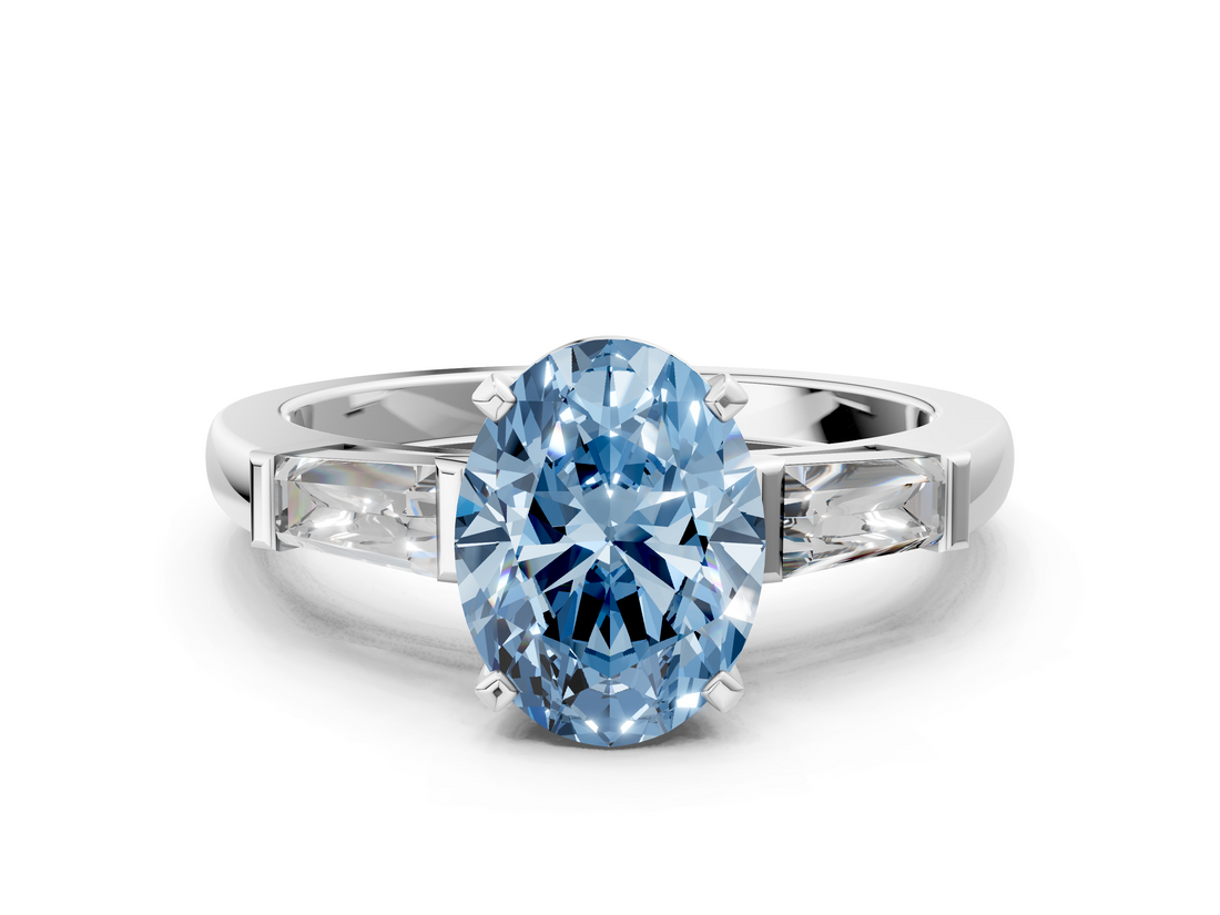 White gold Fancy Blue Oval  Solitaire with Tapered Baguette Side Stones on a Classic Band with Four-Prong Setting_118