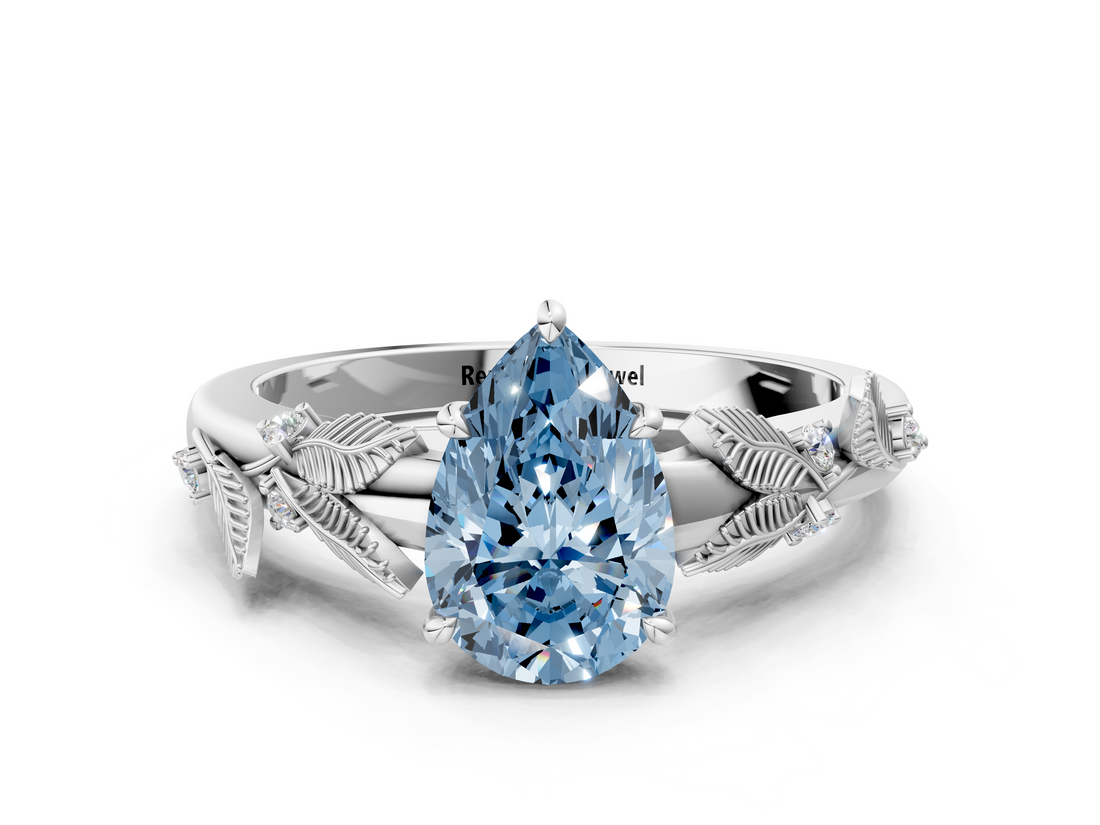 White gold Fancy Blue Pear  Brilliant Solitaire with Leaf Motif Band and Four-Prong Setting_61