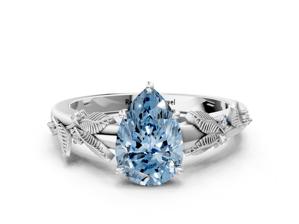 Platinum Fancy Blue Pear Cut Diamond Solitaire Ring with Leaf Motif Band and Four-Prong Setting