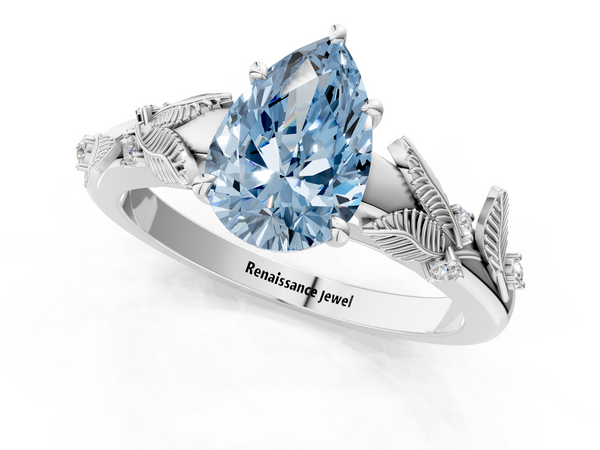 Platinum Fancy Blue Pear Cut Diamond Solitaire Ring with Leaf Motif Band and Four-Prong Setting