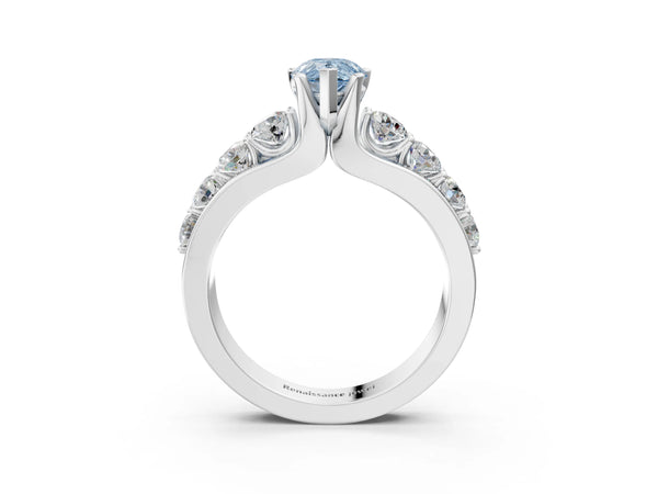 White gold Fancy Blue Pear  Brilliant Solitaire with Side Stones on a Pave Band and Four-Prong Setting