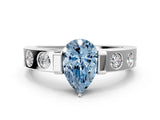White gold Fancy Blue Pear Cut Brilliant Channel-Set Diamond Ring with Bezel Prong Setting