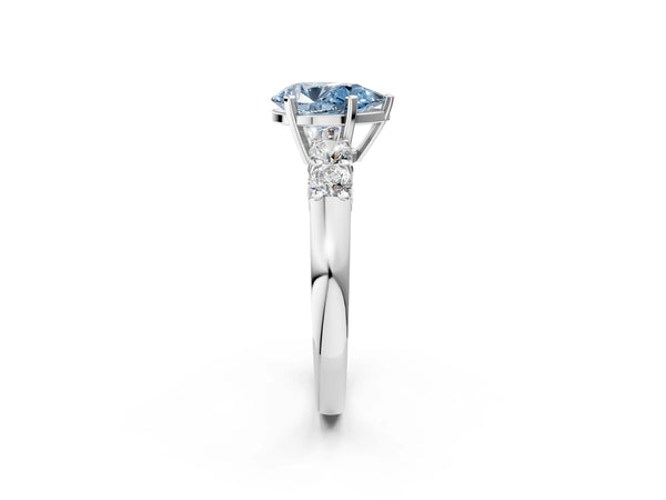 White gold Fancy Blue Pear Cut Brilliant Diamond Five-Stone Engagement Ring with Prong Setting on a Classic Band