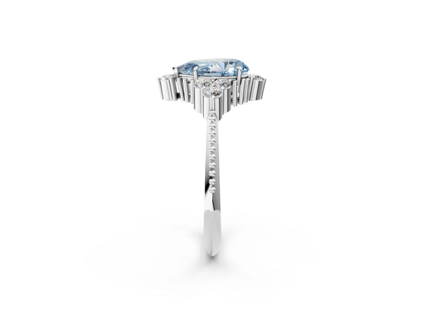 Platinum Fancy Blue Pear Cut Brilliant Diamond with Cluster Setting on a Beaded Band and Four-Prong Setting