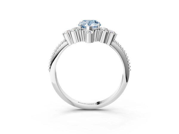 Platinum Fancy Blue Pear Cut Brilliant Diamond with Cluster Setting on a Beaded Band and Four-Prong Setting