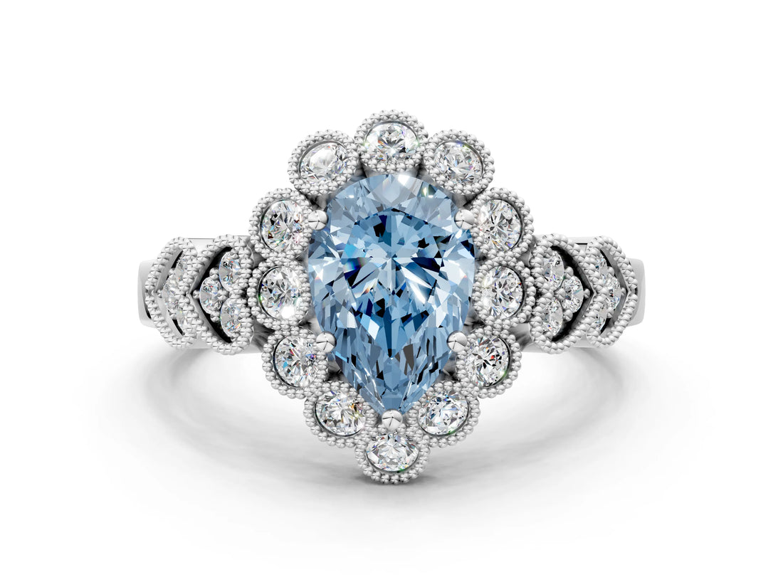 White gold Fancy Blue Pear Cut Brilliant Milgrain Pave Heart Band Solitaire Ring