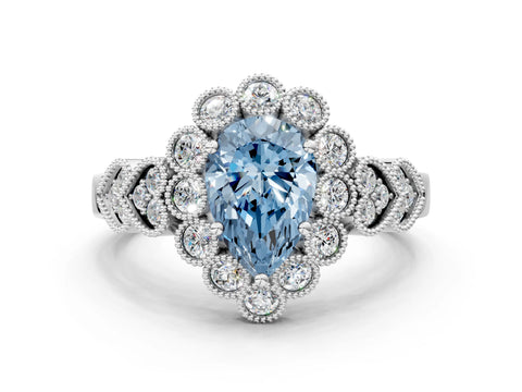 White gold Fancy Blue Pear Cut Brilliant Milgrain Pave Heart Band Solitaire Ring