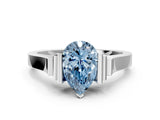 White gold Fancy Blue Pear Cut Brilliant Solitaire Diamond Ring with Channel Set Band and Bar Prong Setting