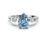 White gold Fancy Blue Pear Cut Brilliant Three-Stone Pave Band with Four-Prong Setting