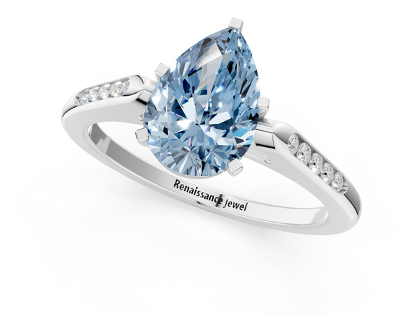 White gold Fancy Blue Pear  Cut Channel Set Solitaire Engagement Ring with Four-Prong Setting