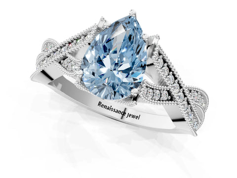 White gold Fancy Blue Pear Cut Cut Diamond Twisted Band with Milgrain Pave Setting and Four-Prong Setting_13