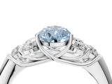 White gold Fancy Blue Pear  Cut Diamond Cluster Ring with Round Accent Stones and Prong Setting on a Classic Band_36