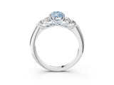 White gold Fancy Blue Pear  Cut Diamond Cluster Ring with Round Accent Stones and Prong Setting on a Classic Band_81