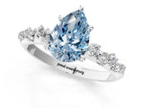 White gold Fancy Blue Pear Cut Diamond Cluster Side Stone Solitaire Ring with Prong Setting_109