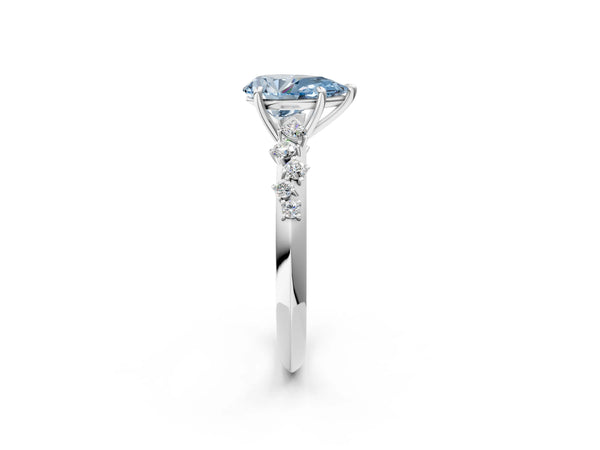 Platinum Fancy Blue Pear Cut Diamond Cluster Side Stone Solitaire Ring with Prong Setting