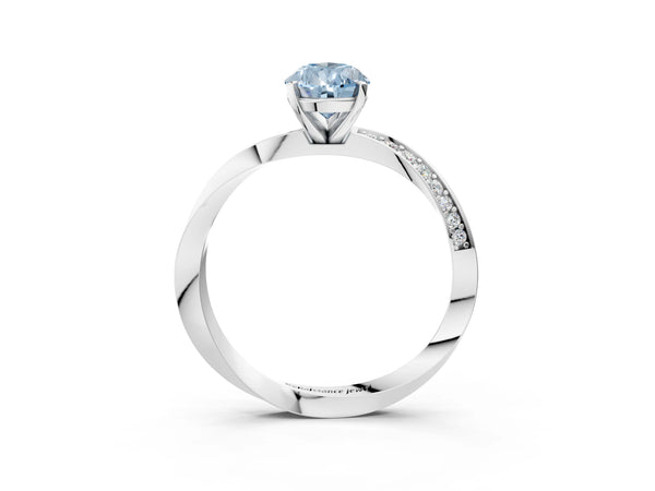 Platinum Fancy Blue Pear Cut Diamond Engagement Ring with Side Stone Accents and Four-Prong Setting