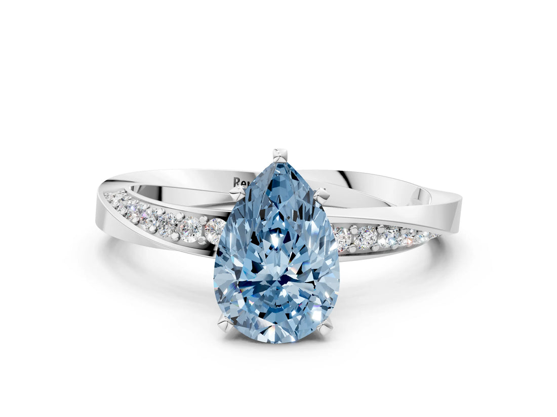 White gold Fancy Blue Pear Cut Diamond Engagement Ring with Side Stone Accents and Four-Prong Setting_84