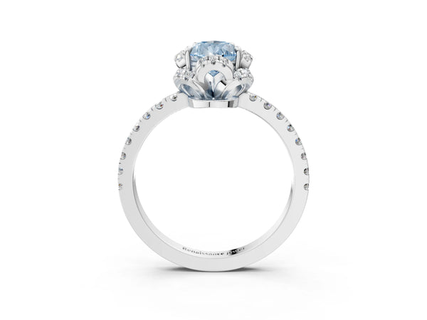 White gold Fancy Blue Pear Cut Diamond Halo Pave Band with Four-Prong Setting