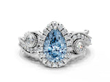White gold Fancy Blue Pear Cut Diamond Halo Ring with Milgrain Pavé Band and Four-Prong Setting_65