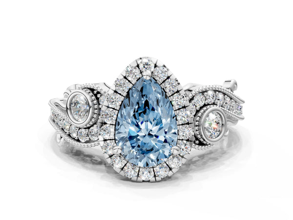 Platinum Fancy Blue Pear Cut Diamond Halo Ring with Milgrain Pavé Band and Four-Prong Setting