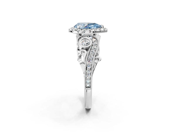 Platinum Fancy Blue Pear Cut Diamond Halo Ring with Milgrain Pavé Band and Four-Prong Setting