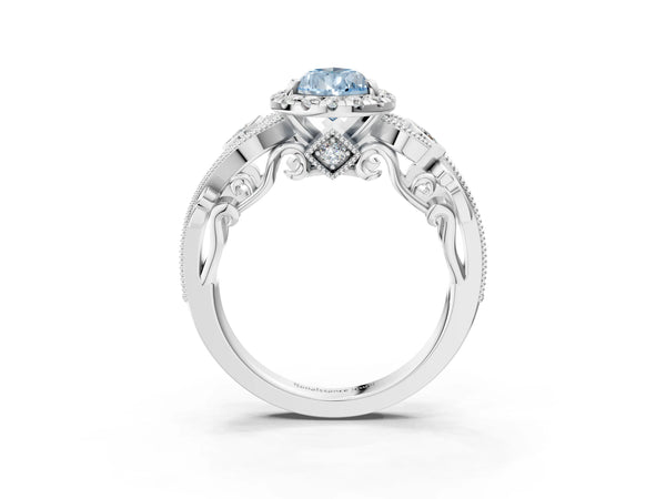 Platinum Fancy Blue Pear Cut Diamond Halo Ring with Milgrain Pavé Band and Four-Prong Setting
