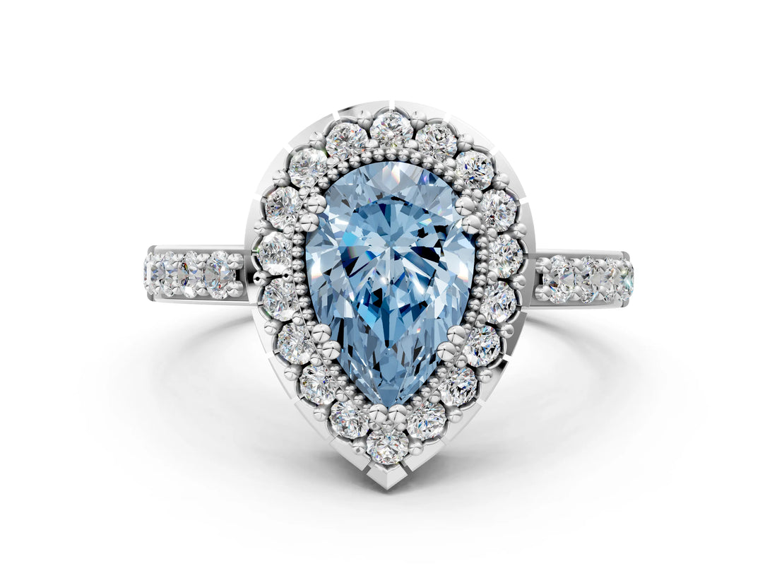 White gold Fancy Blue Pear Cut Diamond Halo Ring with Pavé Band and Prong Setting