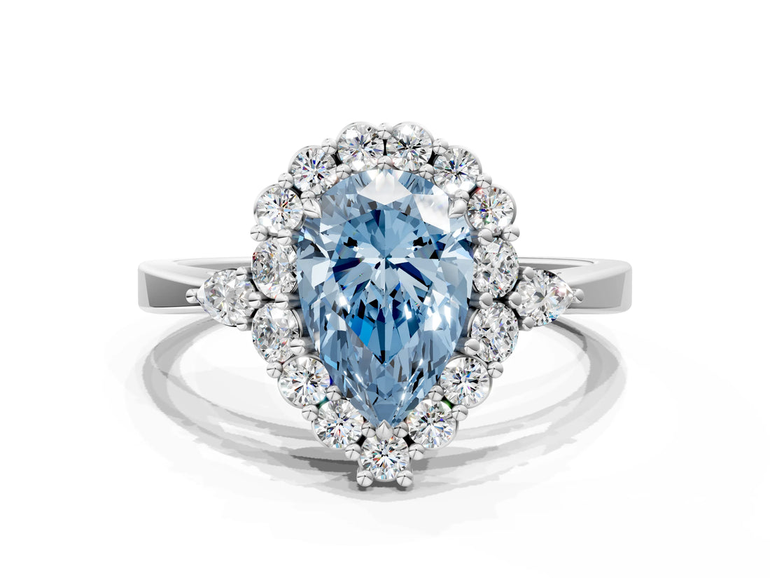 White gold Fancy Blue Pear Cut Diamond Halo Ring with Pear Side Stones and Prong Setting_103