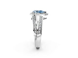 White gold Fancy Blue Pear Cut Diamond Halo Ring with Split Shank Pavé Band and Four-Prong Setting_44