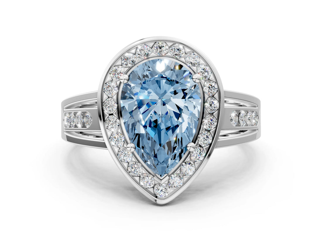 White gold Fancy Blue Pear Cut Diamond Halo Ring with Split Shank and Bezel Accents and Prong Setting