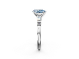 White gold Fancy Blue Pear  Cut Diamond Ring with Baguette Side Stones, Channel Set Band, and Four-Prong Setting_6