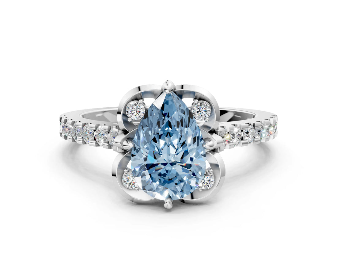 White gold Fancy Blue Pear Cut Diamond Ring with Pavé Band and Floral Prong Setting_39
