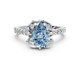 White gold Fancy Blue Pear Cut Diamond Ring with Pavé Band and Floral Prong Setting_39