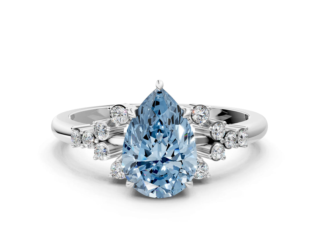 White gold Fancy Blue Pear Cut Diamond Ring with Side Stones and Four-Prong Setting_191
