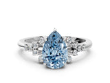 White gold Fancy Blue Pear Cut Diamond Ring with Side Stones and Four-Prong Setting_192