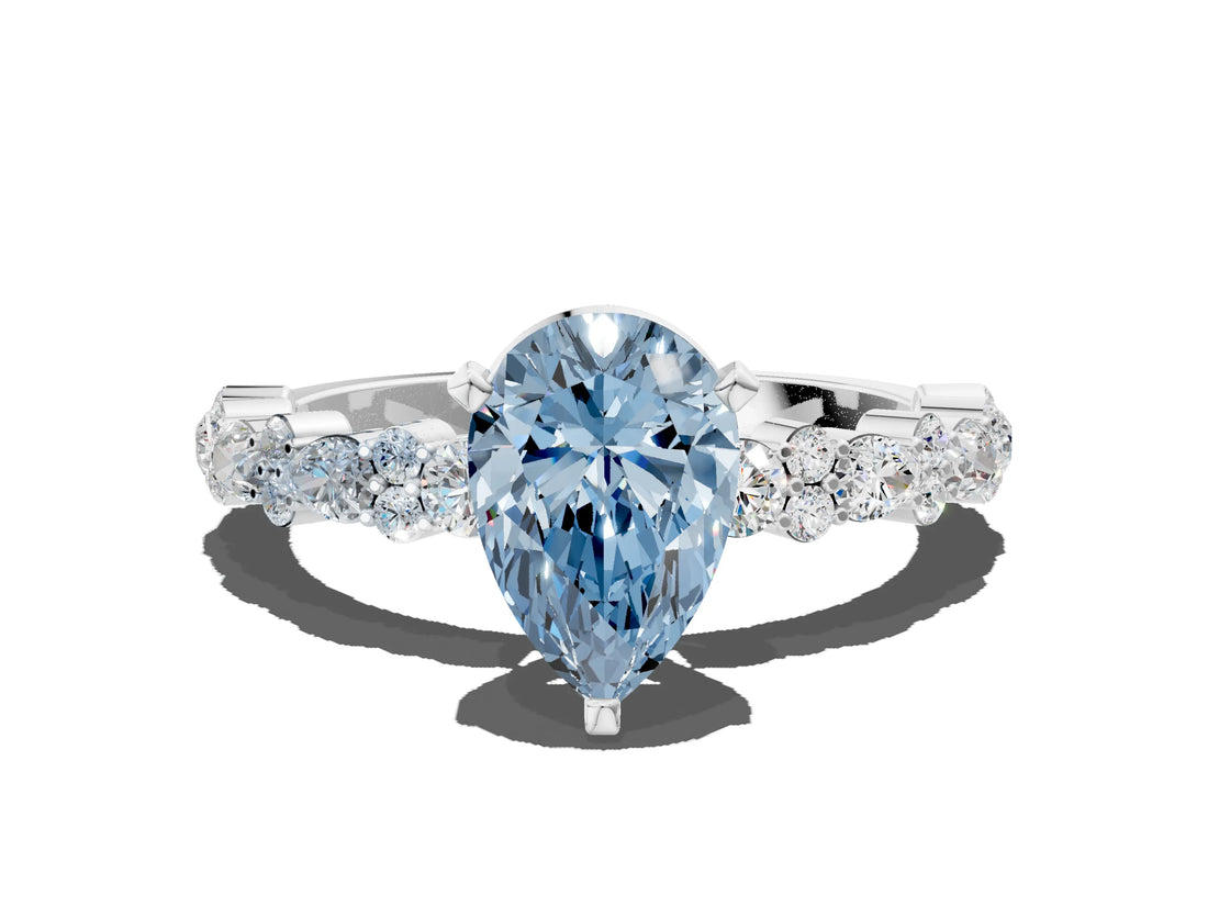 White gold Fancy Blue Pear Cut Diamond Side Stone Solitaire Ring with Round  and Four-Prong Setting_168