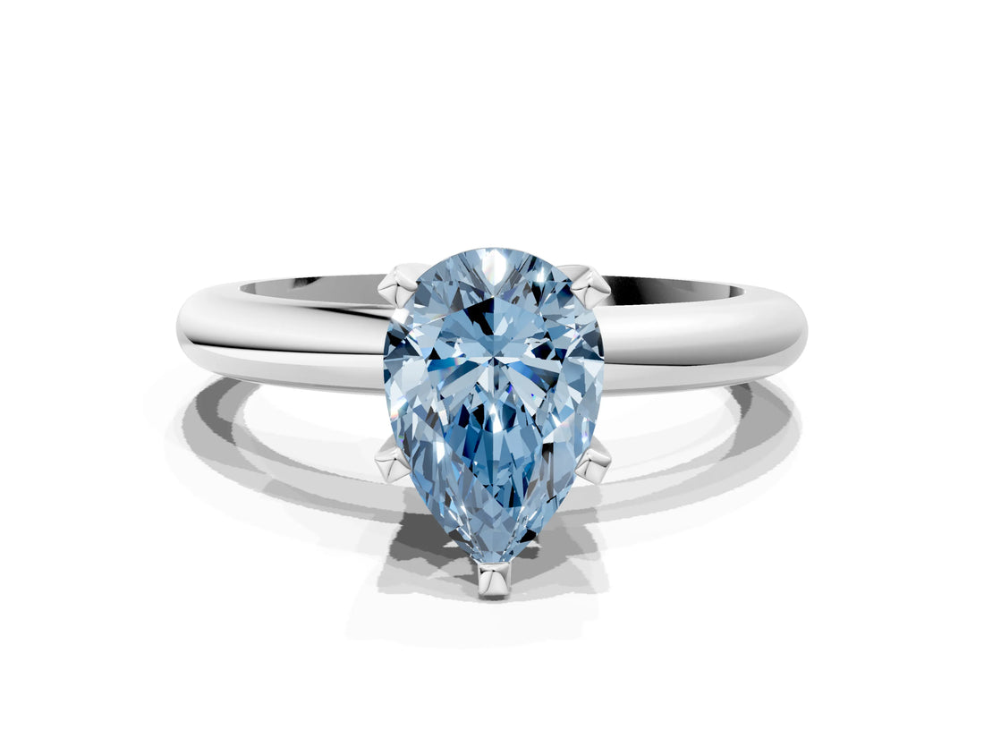 White gold Fancy Blue Pear Cut Diamond Solitaire Engagement Ring with Round Band and Four-Prong Setting_162